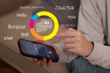 Human hands using smartphone AI language translation application for global communication across multiple cultures