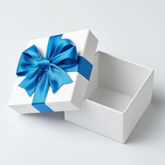 A white gift box with a blue satin ribbon and bow sits open against a plain white background