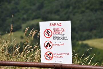 Slovakia warning sign for damaging castle and surrounding property	