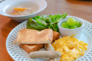 Western breakfast with scrambled eggs and toast
