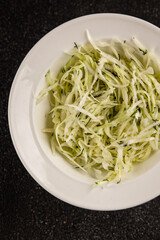 Cabbage salad coleslaw vegetables dish natural product tasty snack fresh delicious gourmet food background on table rustic top view copy space keto and paleo diet vegan and vegan food