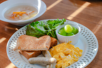 Western breakfast with scrambled eggs and toast
