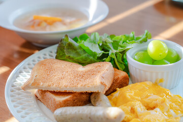 Western breakfast with scrambled eggs and toast
