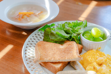 Western breakfast with scrambled eggs and toast
