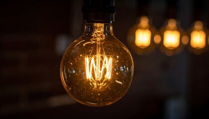 Warm Edison bulb in focus