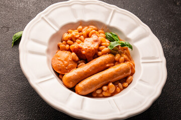 Cassoulet beans with meat and sausage french cuisine vegetables dish natural product tasty snack fresh delicious gourmet food background on the table rustic top view copy space