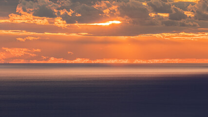 Obraz premium Sunrise over Kamari Beach Santorini