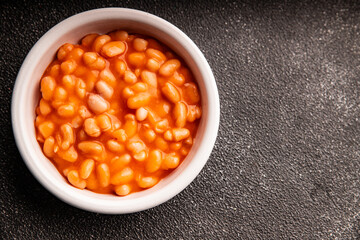 Beans tomato sauce vegetables dish natural product tasty snack fresh delicious gourmet food background on the table rustic top view copy space keto and paleo diet vegan and vegan food