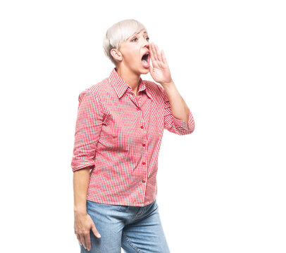 Woman shouting, isolated on white background. Side view of pretty middle aged woman while says something. Copy space - blank space for text.