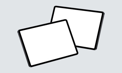 Two horizontal tablets with blank white screens in perspective view. Modern mockup for showcasing app designs, website layouts, and user interface presentations