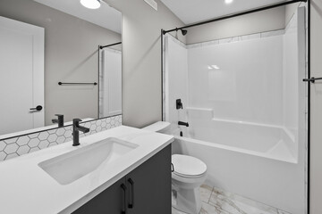 Bathroom with a white toilet and sink