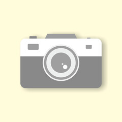 Flat design camera icon illustration on pastel yellow background, simple minimal style vector, digital photography symbol, creative graphic design element for web, app, and media content