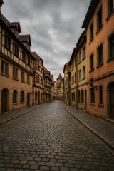 Obraz premium Historic European cobblestone street with old buildings