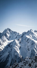 Obraz premium Majestic Snow covered Mountains Under Clear Blue Sky, Winter Landscape