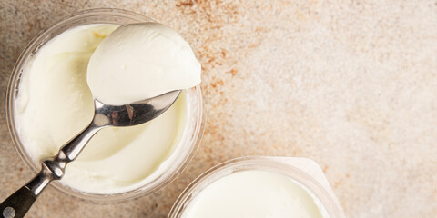 Yogurt or skyr natural dairy lactose free natural product tasty snack fresh delicious gourmet food background on the table rustic top view copy space