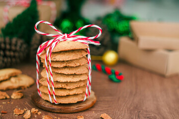 Handmade cookies wrapped with festive rope, capturing the spirit of Christmas and New Year  perfect...
