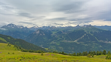 Obraz premium granite mountain peaks with glaciers under a dark stormy sky n La Vanoise national park, Savoie, France 