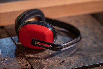 Headphones for eliminating noise when operating mechanisms.