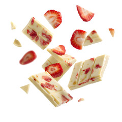 Flying white chocolate pieces and fresh strawberry slices. Creative dessert concept for advertising, isolated on a graphic background.
