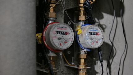 Two utility meters for water consumption monitoring