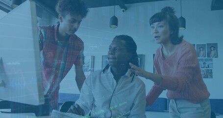 Working group of three coworkers reviewing project on computer in modern office, with pendant lamps
