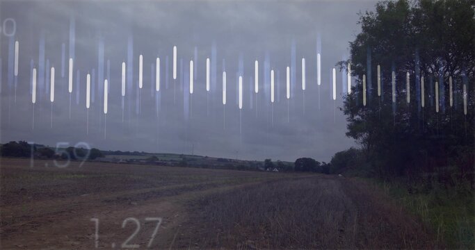 Displaying bare plowed field stretching into rural landscape, featuring audio equalizer overlay