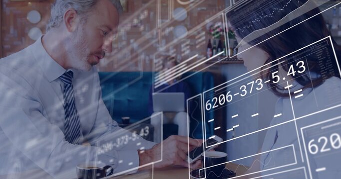 Examining colleagues wearing business attire handling tablet at cafe, cups and digital overlay