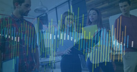 Reviewing data, four coworkers using laptop, clipboard, documents and multicolor overlay in office