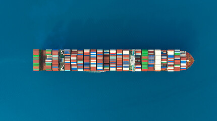 Top view Container ship full capacity approaching port International Container ship loading, unloading at sea port, Freight Transportation, Shipping,Logistics, import export, Transportation. Global