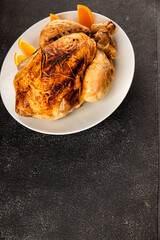 Baked chicken with oranges whole grilled chicken christmas holiday dish new year natural product tasty snack fresh delicious gourmet food background on the table rustic top view copy space