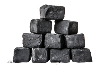 Stacked charcoal briquettes dark background isolated on a transparent background