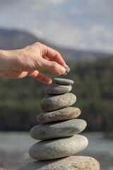 Balancing Stones with Hand