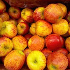 Background of red apples with fruit texture pattern