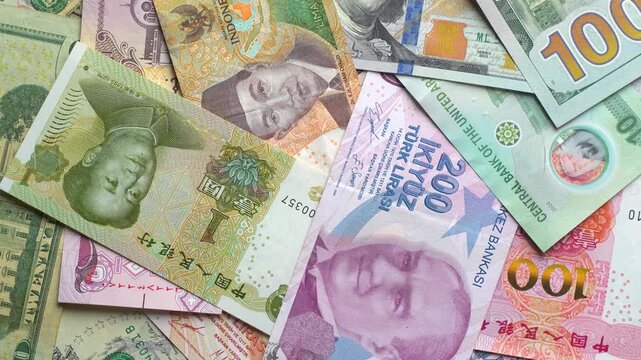 World international banknotes rotating footage. US Dollar american money, Chinese Yuan, UAE Dirham, Indonesian Rupiah, Turkish Lira, Iranian Rials. Business currency finance background