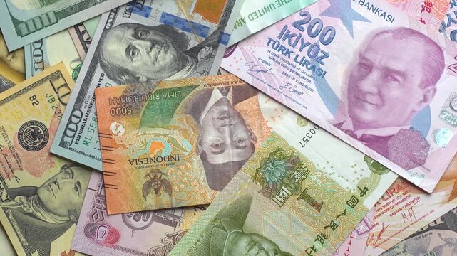 World international banknotes rotating footage. US Dollar american money, Chinese Yuan, UAE Dirham, Indonesian Rupiah, Turkish Lira, Iranian Rials. Business currency finance background