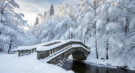 Stone bridge covered in snow in a winter forest landscape
