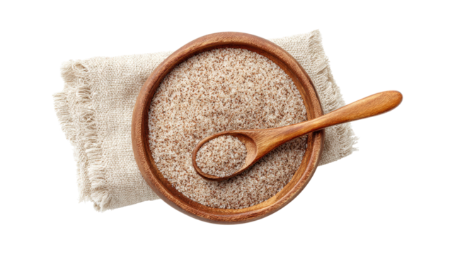 Psyllium husk in the plate with spoon isolated on a white background