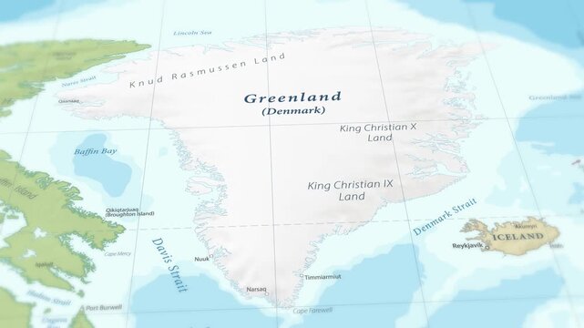 4K macro footage of Greenland on a world map with shallow depth of field. Focus on word Greenland and nearby regions. Travel geography footage
