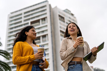 Fototapeta premium College students laughing and interacting after class