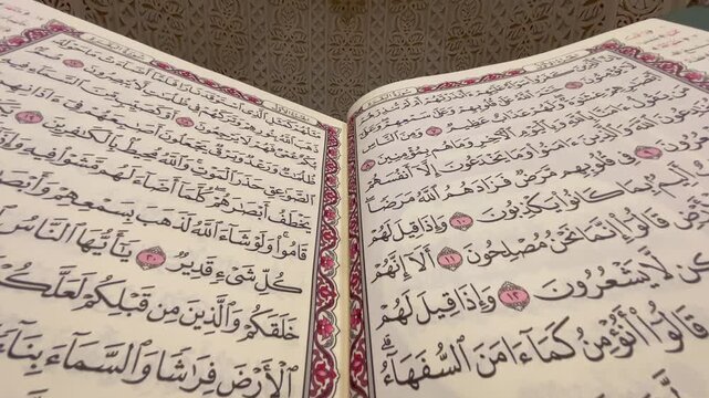 Track-In Cinematic Shot of the Holy Quran Inside a Mosque - HD