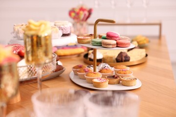Buffet menu. Different delicious desserts on table, selective focus