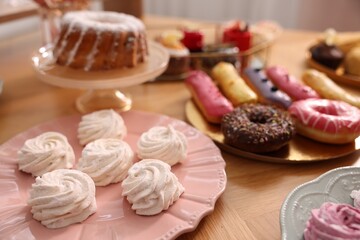 Buffet menu. Different delicious desserts on table, selective focus