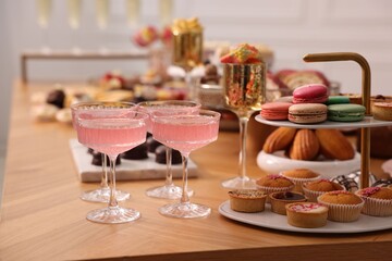 Buffet menu. Delicious desserts and drinks on table, selective focus