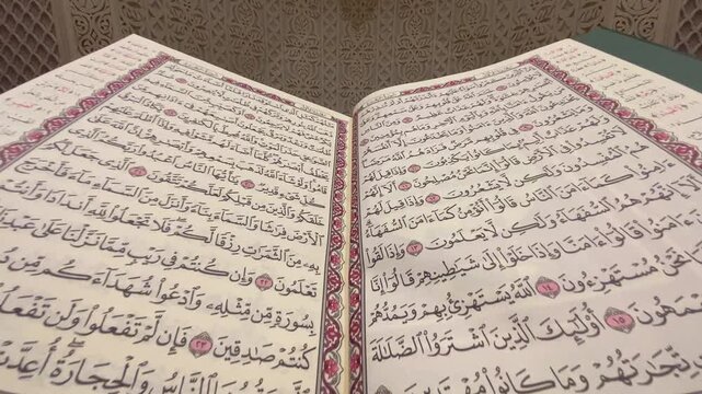 Track-Out Cinematic Shot of the Holy Quran Inside a Mosque - 4K