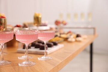 Buffet menu. Delicious desserts and drinks on table, selective focus. Space for text