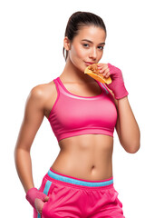 Fit woman enjoying cheat meal, eating taco