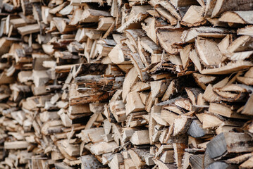 large pile of stacked woods for heating, background, pattern