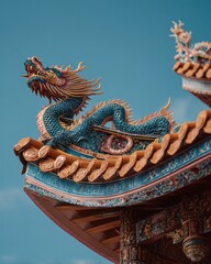 Colorful Dragon Sculpture on a Traditional Roof against a Blue Sky Background