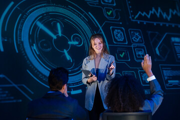 Audience member asking a question during a workshop on cybersecurity, artificial intelligence, and data analysis.