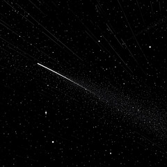 Meteor streaking through space with glowing particles creating dynamic motion in black night sky cosmic background

